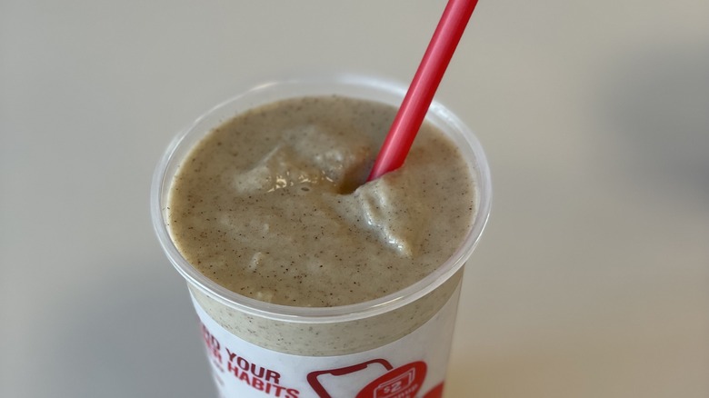 an open smoothie cup