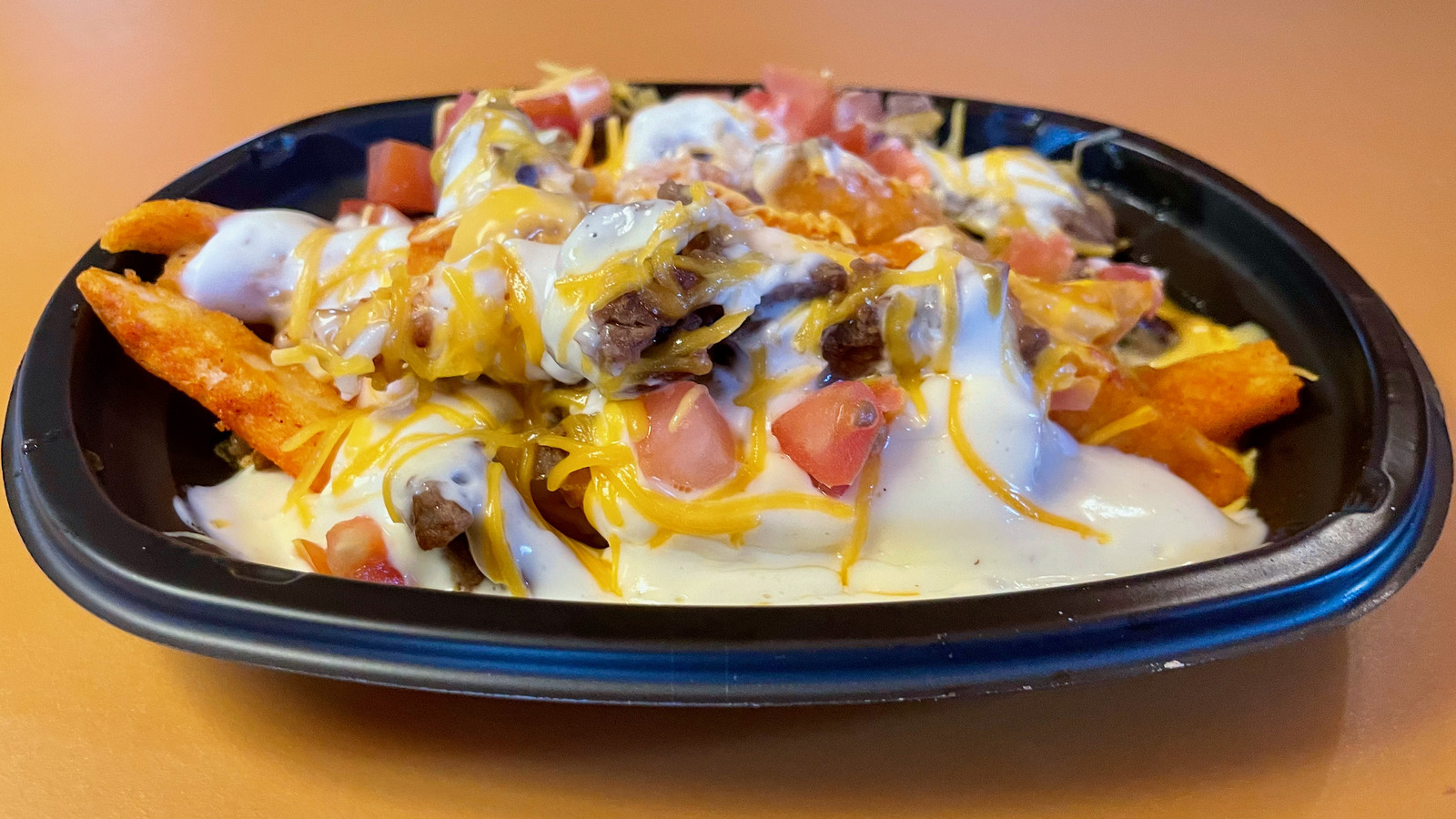 We Tried Taco Bell's Steak White Hot Ranch Nacho Fries. Here's How It Went.