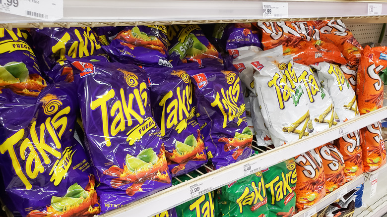 Several Taki bags on grocery shelf