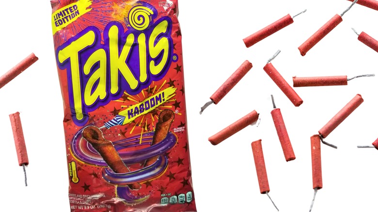 Takis Kaboom chips next to firecrackers
