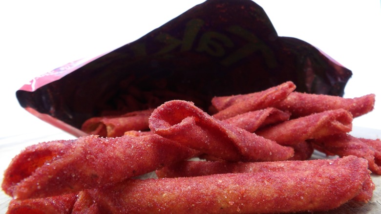 Up close on red-orange Takis Kaboom chips