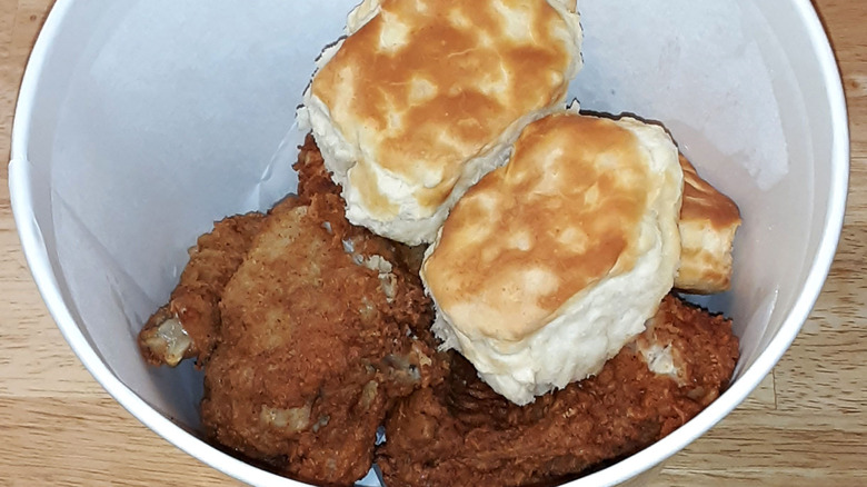 Bucket of KFC chicken with biscuits