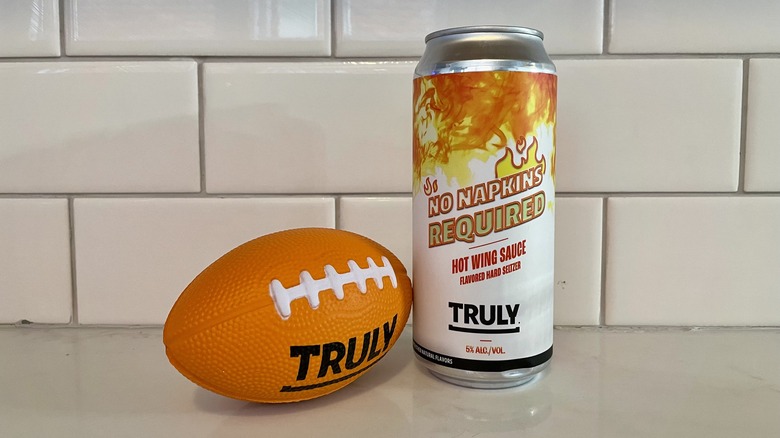 hard seltzer can with toy football