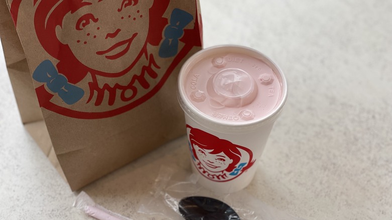 a Wendy's cup and bag