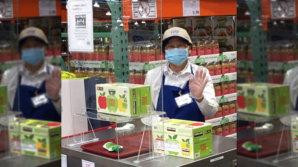 costco employee serves samples during pandemic