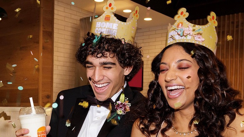 Couple celebrating at Burger King