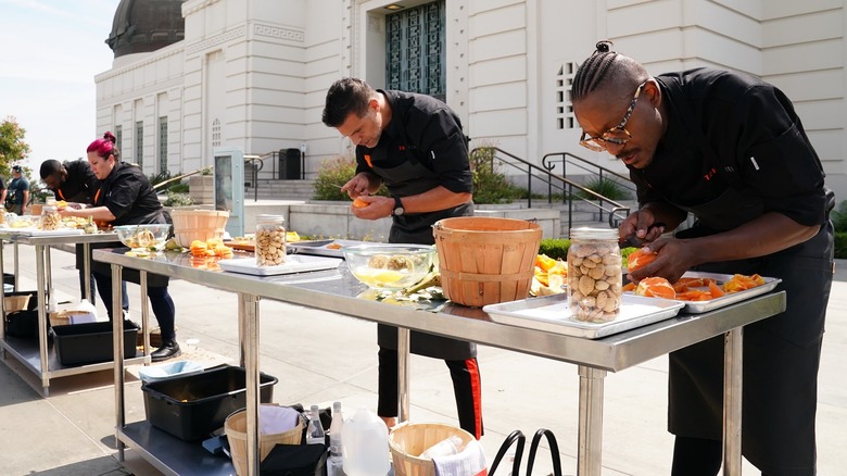 Top Chef contestants working outside