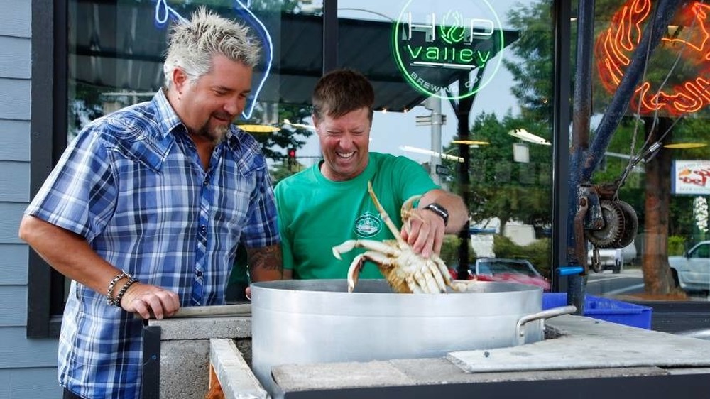 Guy Fieri and chef make crab on Diners, Drive-Ins and Dives