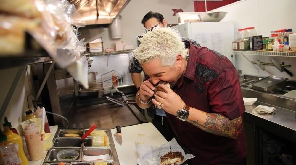 Guy Fieri tastes dish on Diners, Drive-Ins and Dives