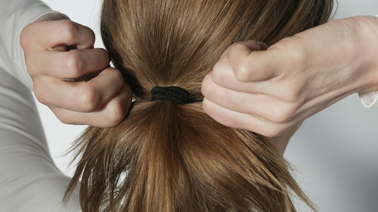 making a ponytail