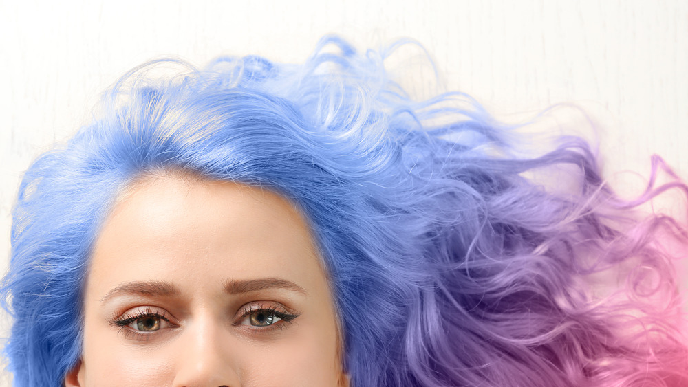 blue and pink ombre hair dye on a woman