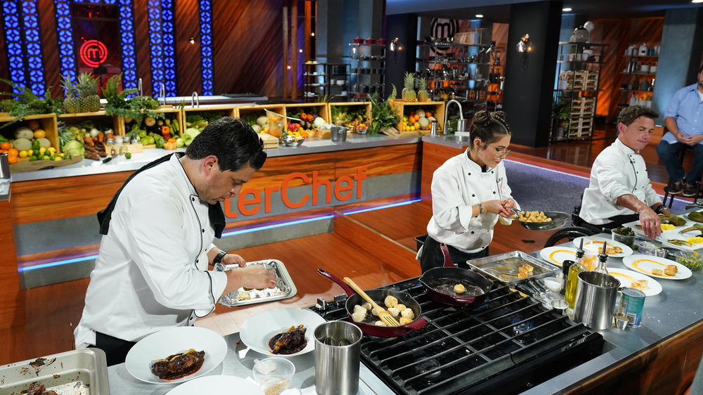 MasterChef participants cooking