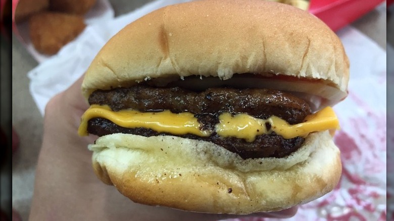 A close-up of a Wendy's Double Stack sandwich