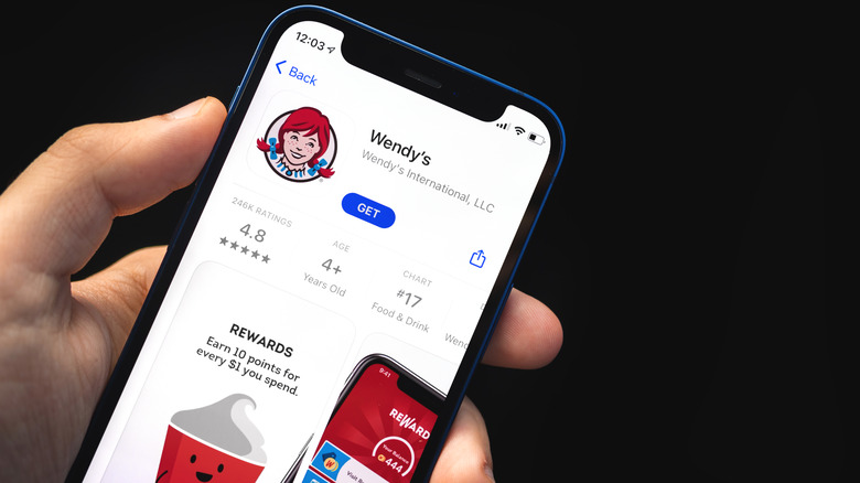 Phone with Wendy's app on the screen