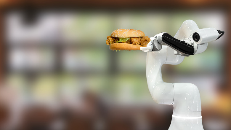 Robot holding hamburger