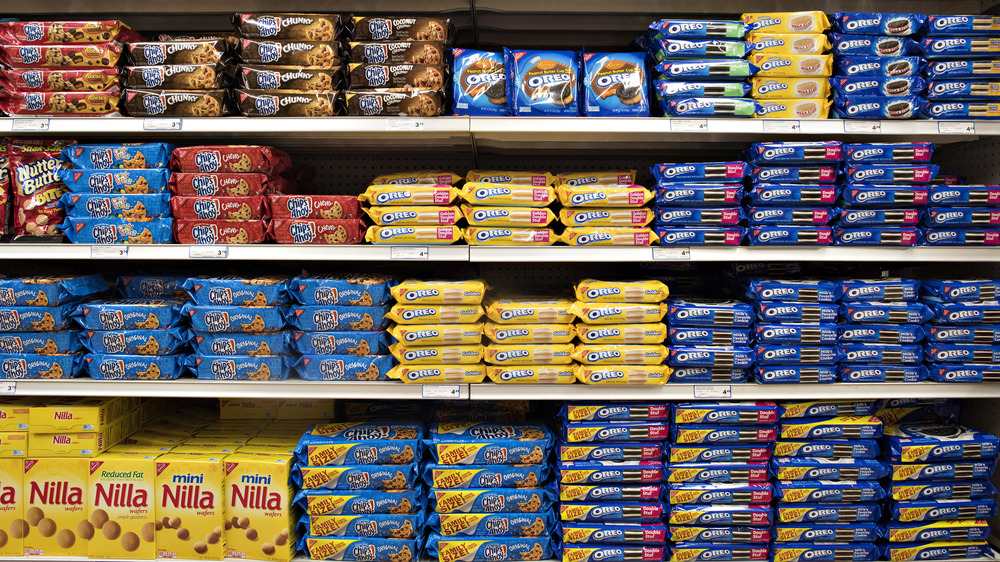 Supermarket shelf of Oreos and other cookies