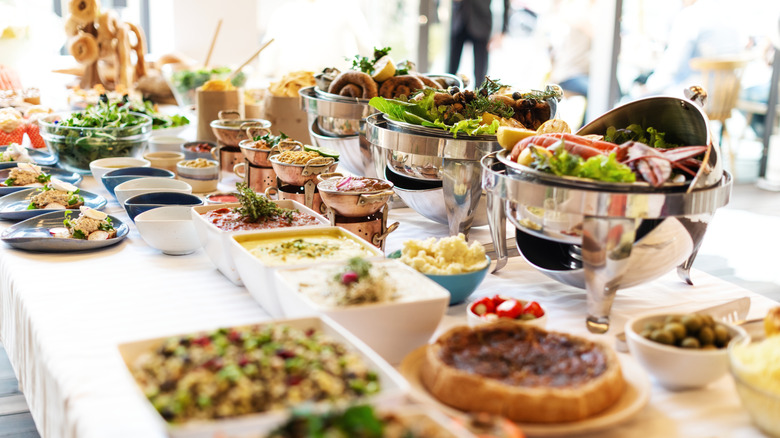 Buffet table filled with food