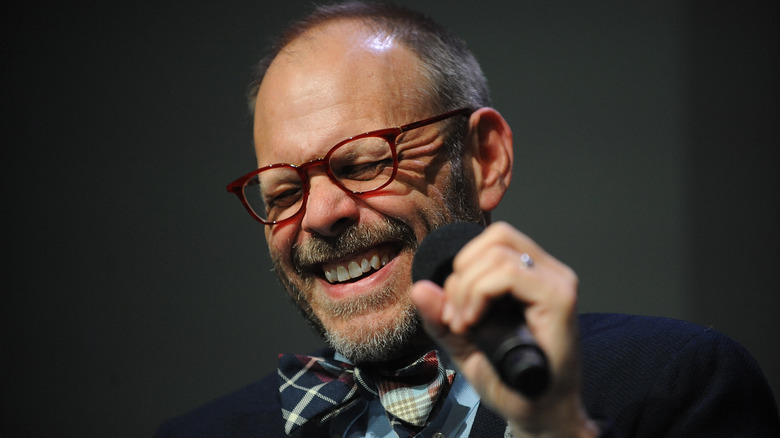 Alton Brown laughing in a candid photo