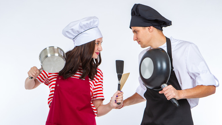 Chefs holding pots and pans