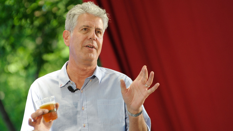 Anthony Bourdain drink in hand