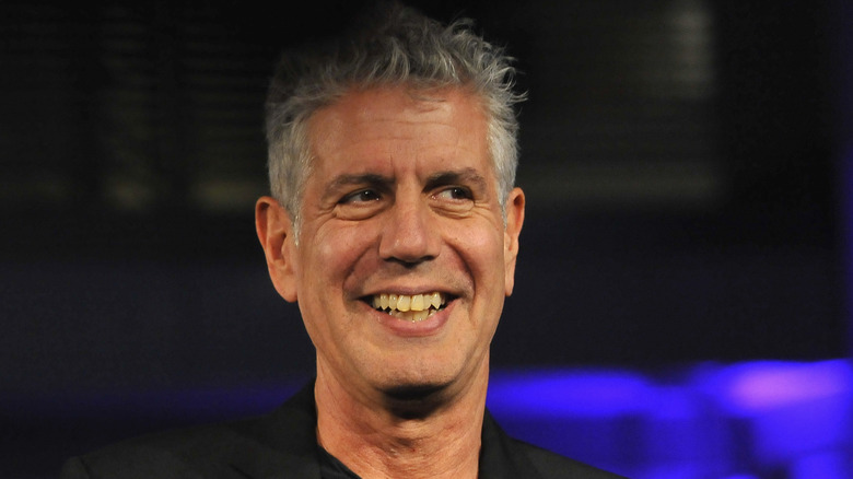 Bourdain smiles