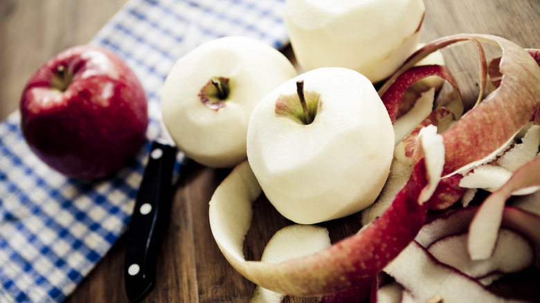 Peeled apples on countertop