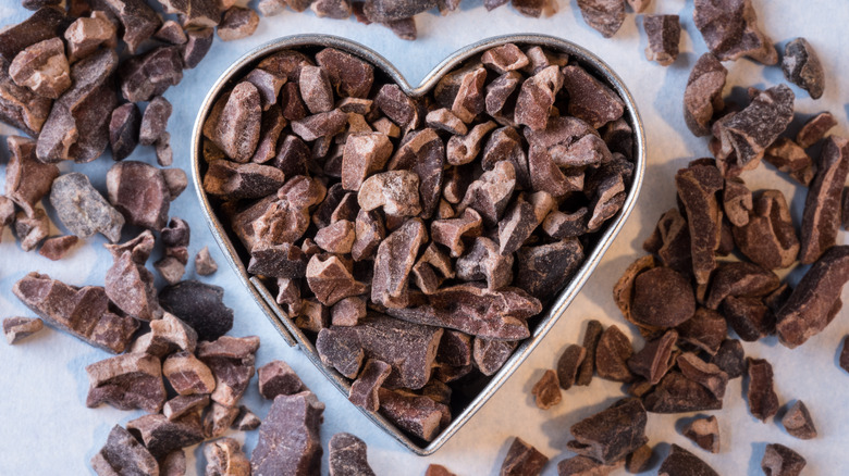 Heart shaped bowl with cacao nibs inside