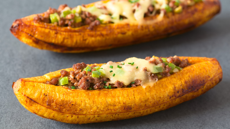 Baked plantains stuffed with meat and cheese