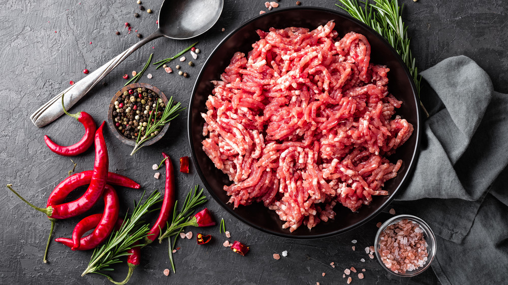 Ground meat and spices in a bowl