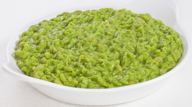 A large dish of mushy peas