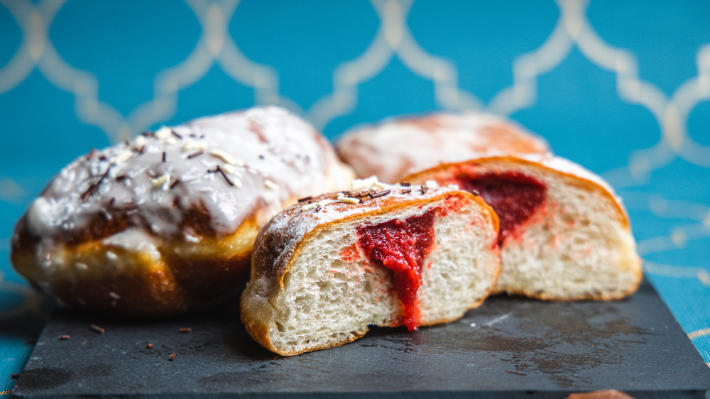 Paczki on a cutting board