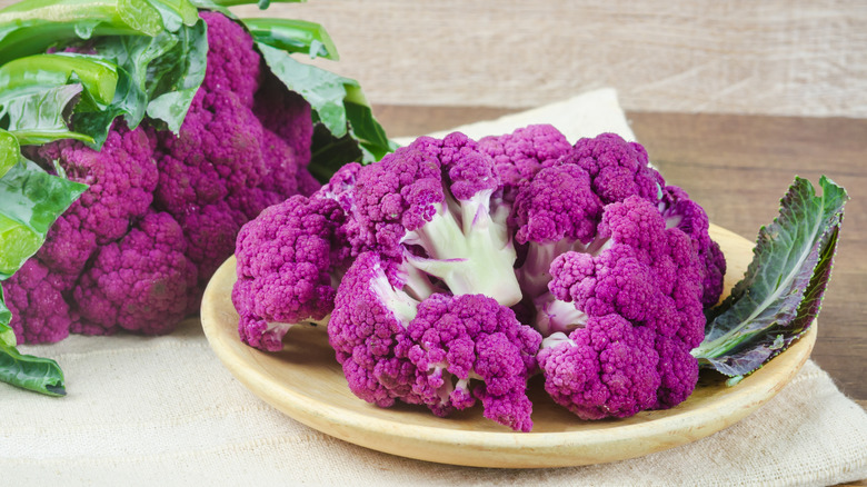 purple cauliflower florets on plate