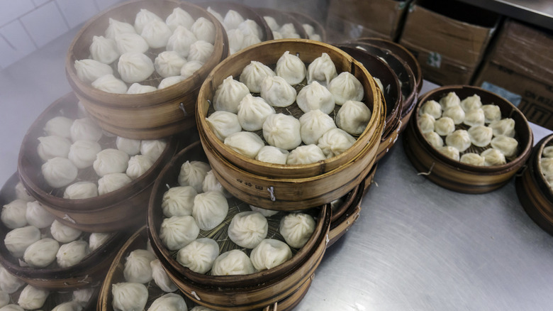 lots of baskets of soup dumplings