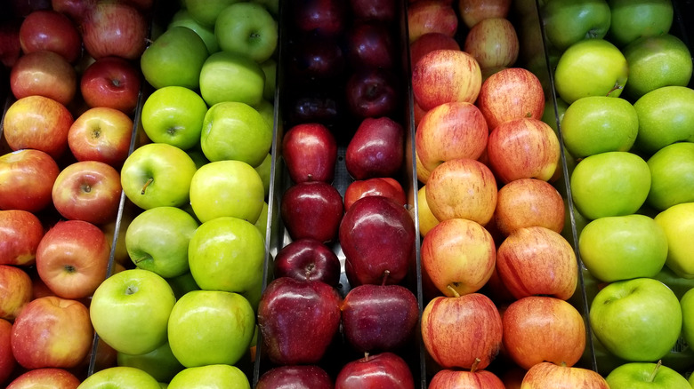 Different colored apples in grocery store