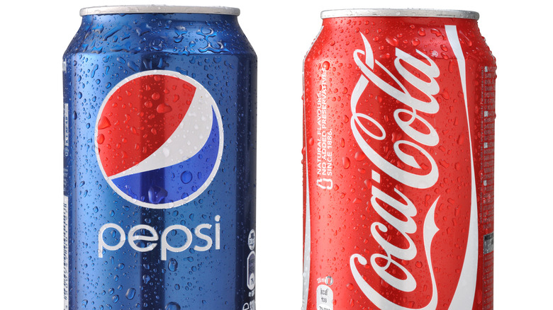 Pepsi and Coke cans