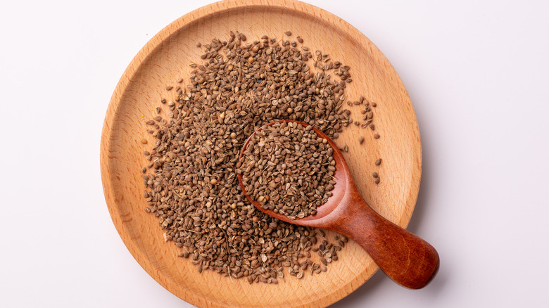 anise seeds in wood bowl