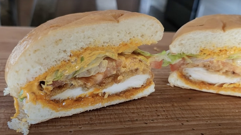 Spicy Chicken strip sandwich split in half showing off the ingredients