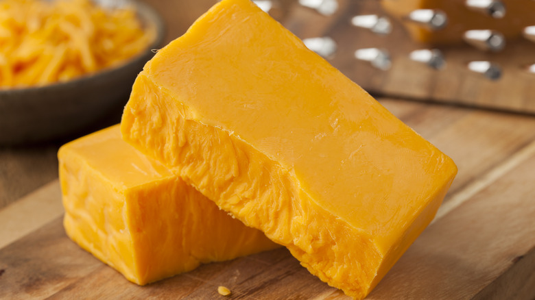 block of orange cheddar