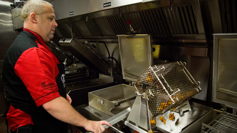 Chick-fil-A employee preparing food