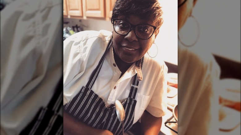 Chopped winner Airis Johnson in a striped apron