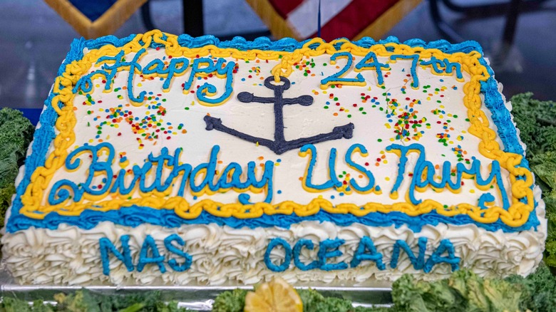 A cake that says "Happy 247th birthday US Navy"