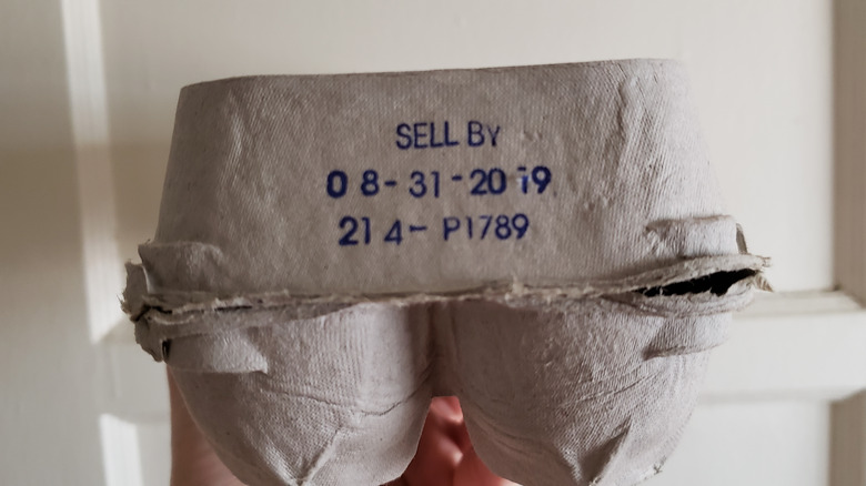 Sell by date printed on egg carton