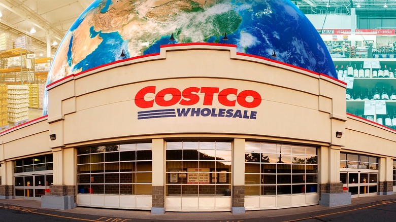 Costco with world on top of storefront