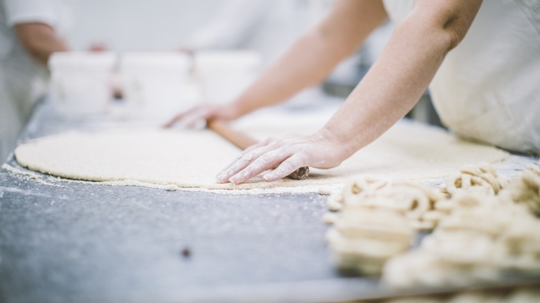 Person making puff pastry 