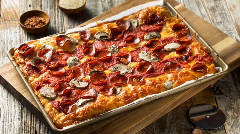 Detroit style pizza on a pan