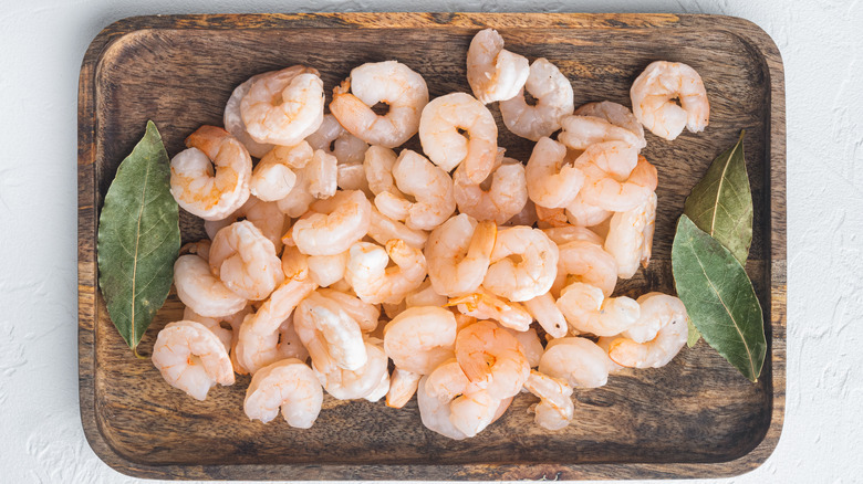 baby shrimp on wooden plate