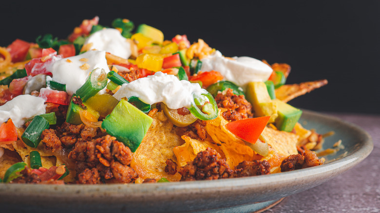 nachos with meat and sour cream