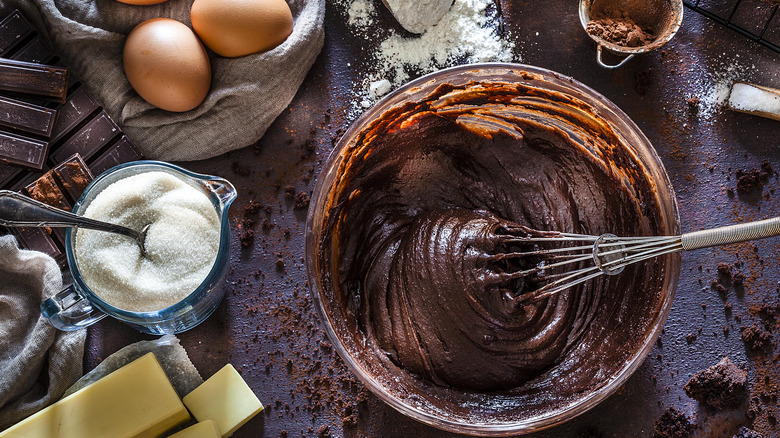 Chocolate cake batter and ingredients