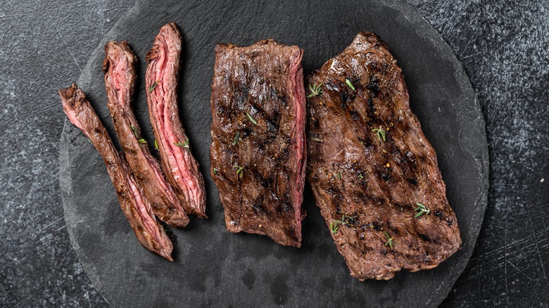 arrachera steak on black plate