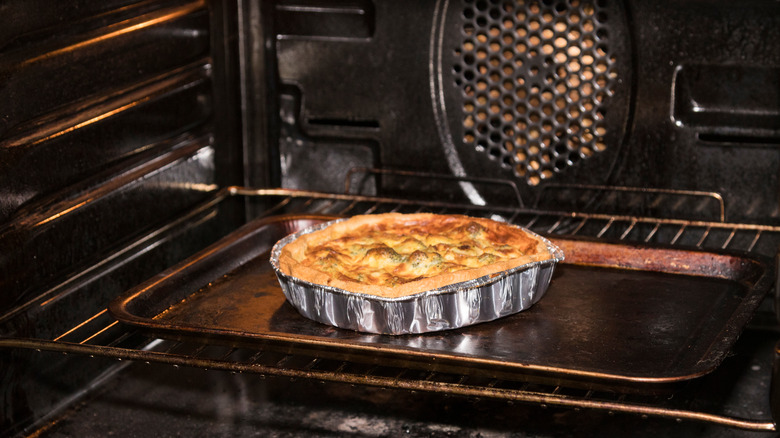 Quiche Lorraine baking in oven